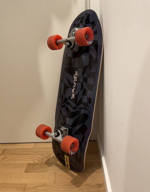 Yow Arica deck with orange wheels